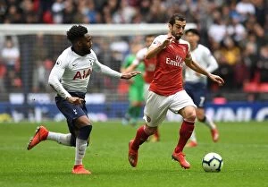 Tottenham Hotspur v Arsenal 2018-19 Collection: Mkhitaryan vs. Rose: A Premier League Showdown at Wembley