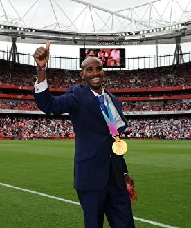 Images Dated 10th September 2011: Mo Farah and Family Celebrate Arsenal's Victory over Swansea City in the Premier League