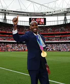 Arsenal V Swansea City 2011-12 Prints: Mo Farah and Family Celebrate Arsenal's Victory over Swansea City in the Premier League