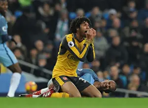 Manchester City V Arsenal 2016-17 Prints: Mohamed Elneny of Arsenal Faces Off Against Manchester City in Premier League Clash (2016-17)