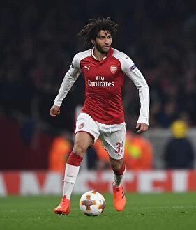 Arsenal v Red Star Belgrade 2017-18 Collection: Mohamed Elneny: Arsenal's Midfield Maestro Shines in Europa League Clash against Red Star Belgrade