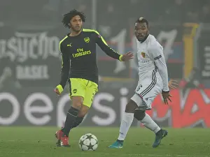 FC Basel V Arsenal 2016-17 Prints: Mohamed Elneny Breaks Past Basel's Geoffroy Serey Die