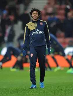 Stoke City V Arsenal 2015-16 Prints: Mohamed Elneny Gears Up: Arsenal's Midfield Maestro Prepares for Stoke City Showdown (2015-16)