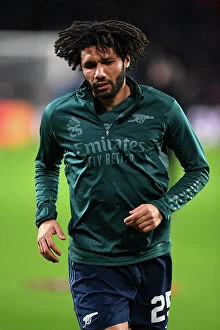 Images Dated 12th December 2023: Mohamed Elneny Prepares for Arsenal's Champions League Clash against PSV Eindhoven (2023-24)