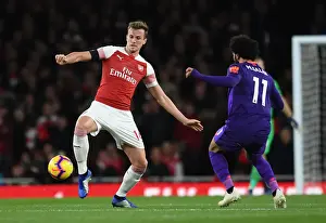 Arsenal V Liverpool 2018-19 Prints: Mohamed Salah Closes In on Rob Holding: Intense Battle at Arsenal's Emirates Stadium