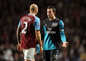 Aston Villa V Arsenal 2011-12 Prints: A Moment of Unity: Robin van Persie and Alan Hutton's Chat Amidst the Aston Villa vs