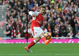 Arsenal V Tottenham Hotspur 2016-17 Prints: Monreal in Action: Arsenal vs. Tottenham (2016-17) - Emirates Stadium Showdown
