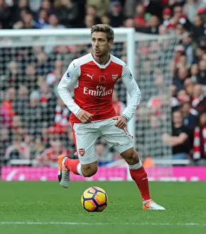 Monreal in Action: Arsenal vs. Tottenham Rivalry at Emirates Stadium (2016-17)