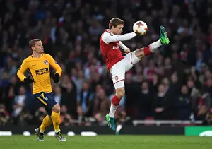 Arsenal V Atletico Madrid 2017-18 Prints: Monreal under Pressure: Arsenal's Nacho Fends Off Griezmann in Europa League Semi-Final Clash