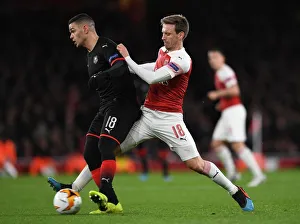 Arsenal V Stade Rennais 2018-19 Prints: Monreal vs Ben Arfa: A Tense Europa League Showdown at Arsenal's Emirates Stadium (Arsenal v Stade Rennais 2018-19)