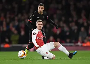 Arsenal V Stade Rennais 2018-19 Prints: Monreal vs Ben Arfa: Intense Clash in Arsenal's Europa League Battle Against Stade Rennais