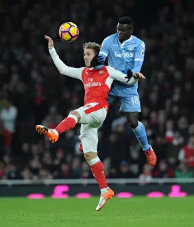 Arsenal V Stoke City 2016-17 Prints: Monreal vs. Diouf: Heading Battle at Emirates Stadium - Arsenal v Stoke City