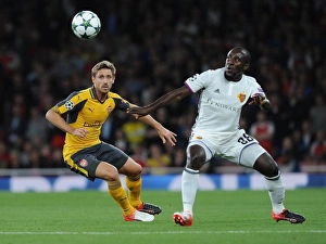 Arsenal V FC Basel 2016-17 Prints: Monreal vs. Doumbia: A Battle in the Arsenal vs. FC Basel Champions League Clash