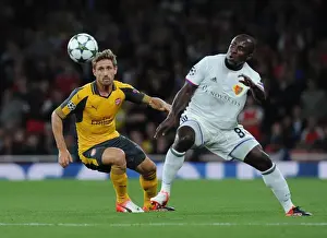 Arsenal V FC Basel 2016-17 Prints: Monreal vs. Doumbia: A Champions League Battle at Emirates Stadium