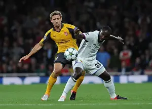 Arsenal V FC Basel 2016-17 Prints: Monreal vs. Doumbia: A Champions League Showdown at Arsenal's Emirates Stadium