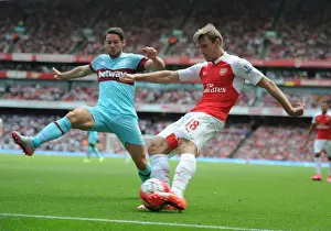 Arsenal V West Ham United 2015-16 Prints: Monreal vs. Jarvis: A Football Battle at Emirates - Arsenal vs. West Ham United (2015-16)