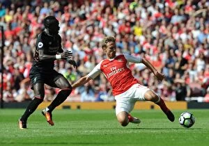 Images Dated 14th August 2016: Monreal vs. Mane: Intense Rivalry Unfolds - Arsenal vs. Liverpool (Premier League 2016-17)