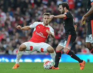 Arsenal V Manchester United 2015/16 Prints: Monreal vs Mata: Clash of the Titans in Arsenal vs Manchester United (2015/16)
