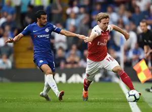 Chelsea V Arsenal 2018-19 Prints: Monreal vs Pedro: A Football Rivalry Ignites at Stamford Bridge