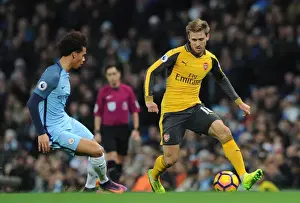 Manchester City V Arsenal 2016-17 Prints: Monreal vs Sane: Intense Battle at Etihad Stadium - Manchester City vs Arsenal