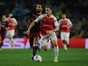Barcelona V Arsenal 2015-16 Prints: Monreal vs Turan: A Football Battle at Camp Nou - Arsenal vs Barcelona
