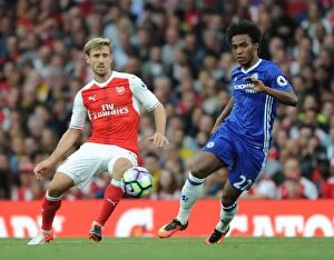 Images Dated 24th September 2016: Monreal vs. Willian: A Battle in the Arsenal vs. Chelsea Rivalry (2016-17)