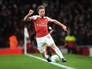 Arsenal V Tottenham Hotspur Carabao Cup 2018-19 Prints: Monreal's Focus: Arsenal vs. Tottenham Carabao Cup Showdown