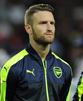 Paris Saint Gernain V Arsenal 2016-17 Prints: Mustafi in Action: Arsenal vs. Paris Saint-Germain, UEFA Champions League 2016-17