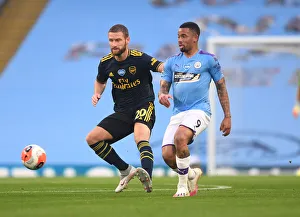 Mustafi Closes In: Manchester City vs. Arsenal FC - Premier League Showdown