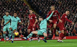Images Dated 29th December 2018: Mustafi Faces Off Against Fabinho and Firmino: Liverpool vs Arsenal