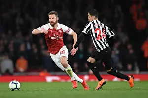 Arsenal V Newcastle United 2018-19 Prints: Mustafi Outmuscles Almiron: Intense Moment from Arsenal vs Newcastle Premier League Clash