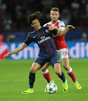 Paris Saint Gernain V Arsenal 2016-17 Prints: Mustafi vs Cavani: A Champions League Showdown in Paris