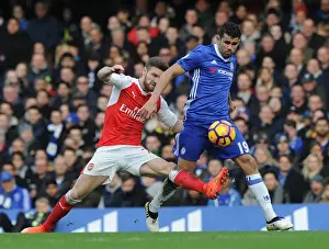 Chelsea V Arsenal 2016-17 Prints: Mustafi vs Costa: A Footballing Battle in the Premier League Clash between Chelsea and Arsenal (2016-17)