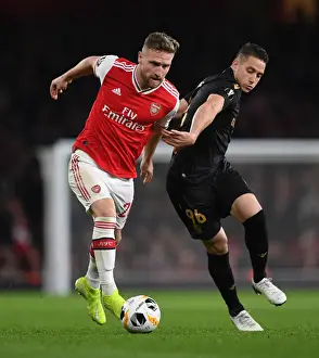 Mustafi vs Duarte: A Central Battle in Arsenal's Europa League Clash against Vitoria Guimaraes