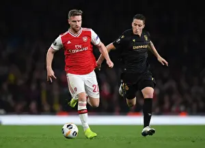 Arsenal V Vitoria Club 2019-20 Prints: Mustafi vs Duarte: A Europa League Showdown at Arsenal's Emirates Stadium
