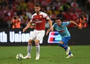 Arsenal V Atletico Madrid 2018-19 Prints: Mustafi vs. Gereiro: Arsenal vs. Atletico Madrid Clash in International Champions Cup 2018