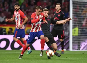 Atletico Madrid V Arsenal 2017-18 Prints: Mustafi vs. Griezmann: Battle in the Europa League Semi-Finals
