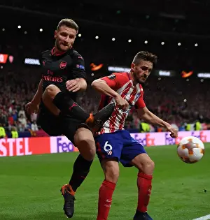Atletico Madrid V Arsenal 2017-18 Prints: Mustafi vs Koke: Intense Clash in Arsenal's Europa League Semi-Final Showdown against Atletico Madrid