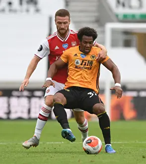 Wolverhampton Wanderers V Arsenal 2019-20 Prints: Mustafi vs Traore: Intense Battle at Molineux - Wolverhampton Wanderers vs Arsenal FC