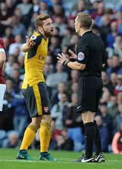 Burnley V Arsenal 2016-17 Prints: Mustafi's Contentious Clash with Referee Craig Pawson during Burnley vs Arsenal (2016-17)