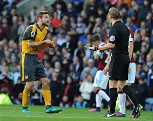 Burnley V Arsenal 2016-17 Prints: Mustafi's Contentious Encounter with Referee Craig Pawson during Burnley vs Arsenal (2016-17)
