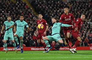 Images Dated 29th December 2018: Mustafi's Tussle: Fabinho and Firmino vs Arsenal's Defender (2018-19)