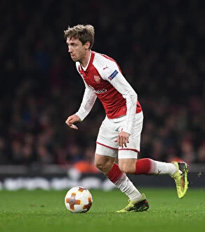 Images Dated 15th March 2018: Nacho Monreal in Action: Arsenal vs AC Milan, UEFA Europa League 2018