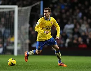 Images Dated 13th January 2014: Nacho Monreal in Action: Aston Villa vs. Arsenal, Premier League 2013-14