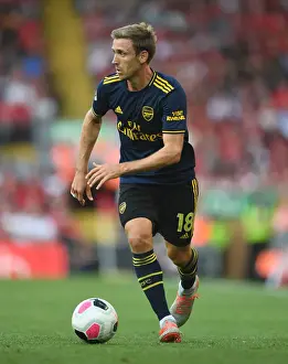 Nacho Monreal in Action: A Riveting Moment from the Liverpool vs. Arsenal Premier League Clash 2019-20