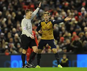 Nacho Monreal Contests Referee Decision During Intense Liverpool vs. Arsenal Premier League Clash (2015-16)