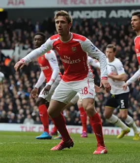 Tottenham Hotspur V Arsenal 2014-15 Prints: Nacho Monreal Focuses in Arsenal's Battle at White Hart Lane (Tottenham Hotspur vs Arsenal)