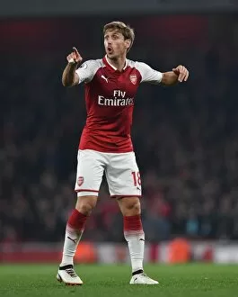 Arsenal v West Bromwich Albion 2017-18 Collection: Nacho Monreal Focuses in Arsenal's Victory Against West Bromwich Albion (2017-18)