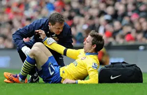 Liverpool V Arsenal 2013-14 Prints: Nacho Monreal Receives Treatment from Arsenal Physio during Liverpool vs Arsenal Match (2014)