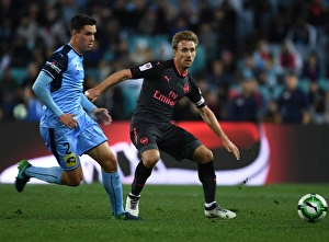 Sydney FC V Arsenal - 2017-18 Prints: Nacho Monreal vs. John Iredale: Sydney FC vs. Arsenal Pre-Season Clash